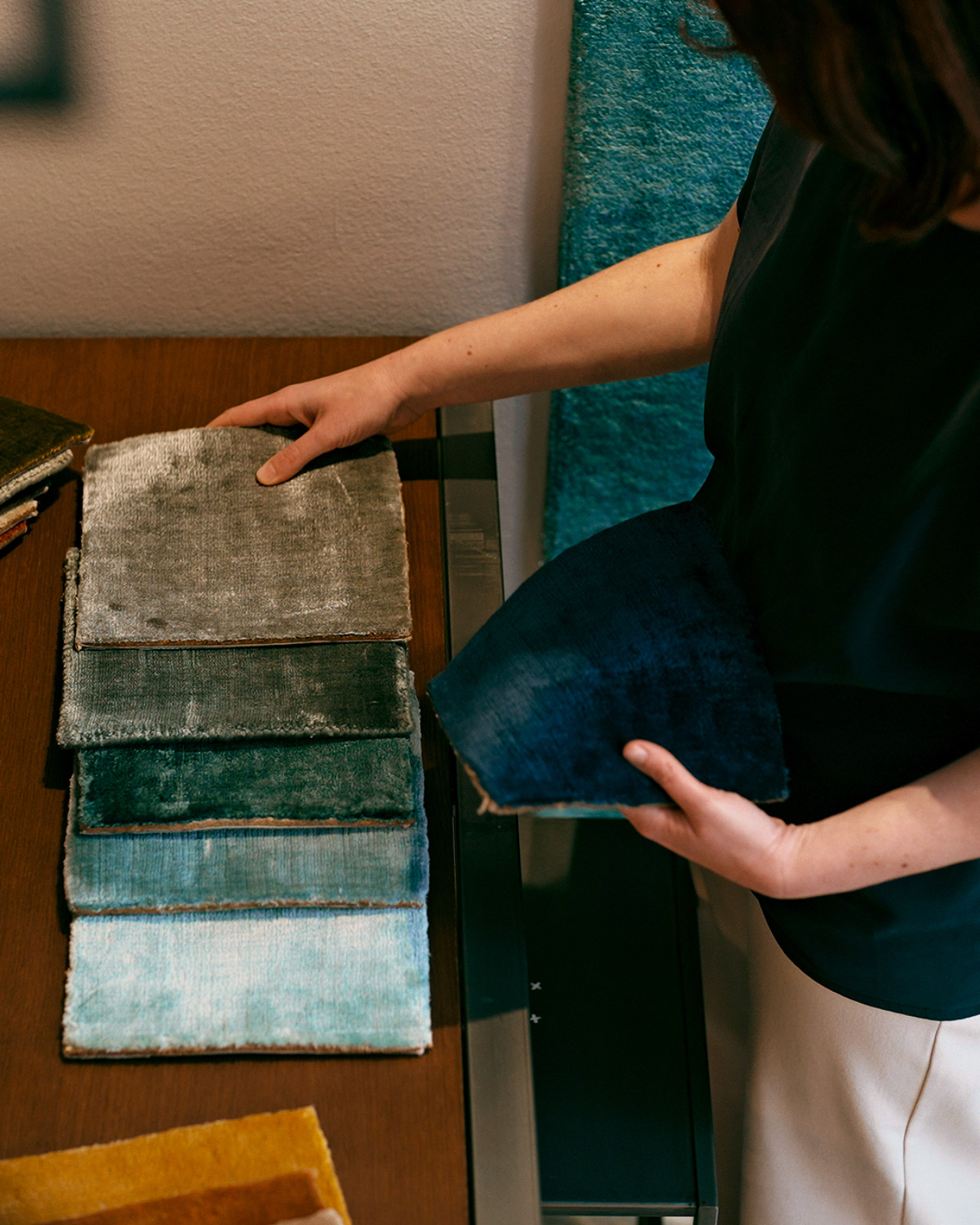 Selection of handwoven blue rug swatches in varying shades